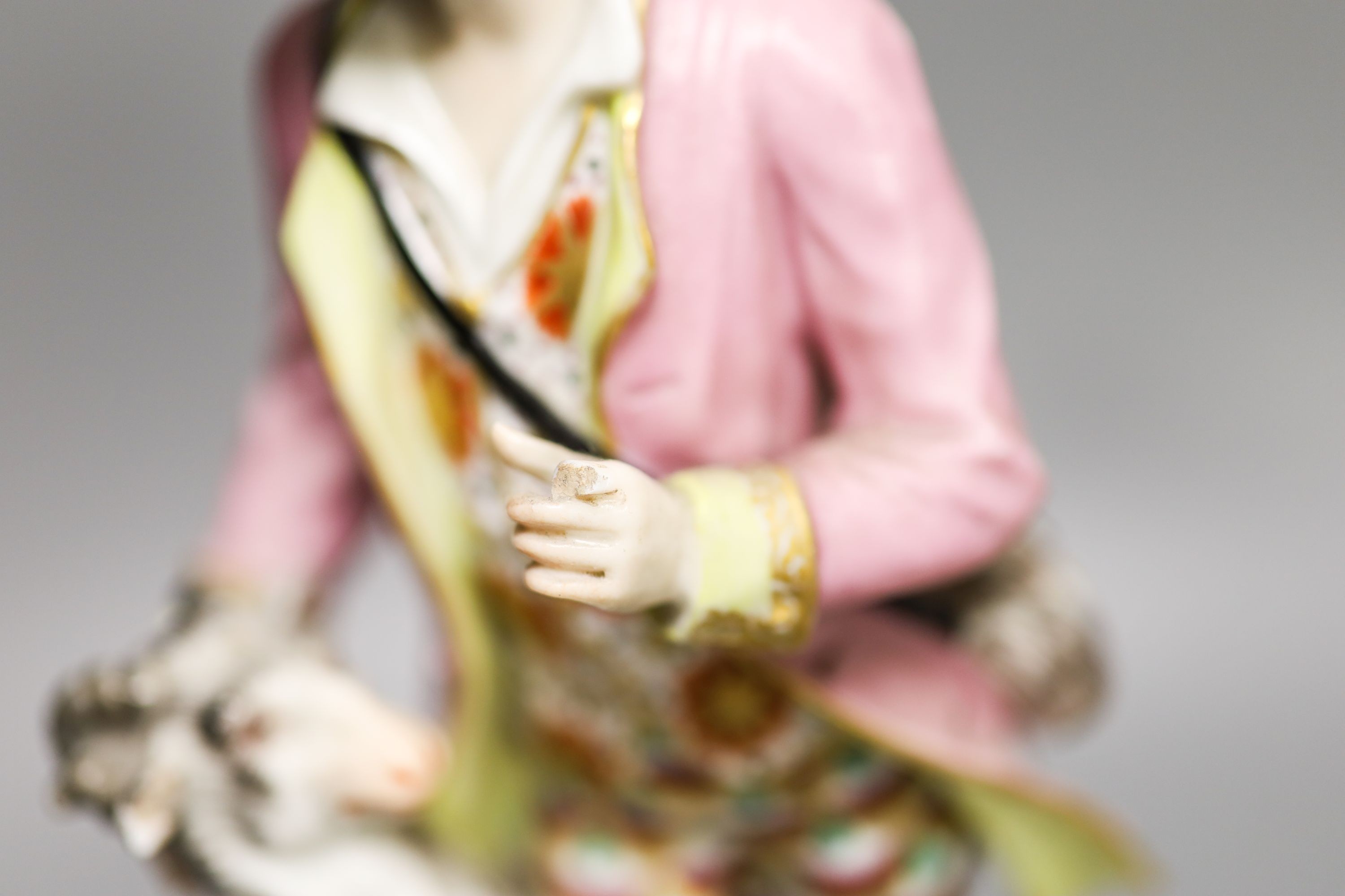 A Samuel Alcock parian group of a maid and sheep, a similar Minton biscuit group and a Samson porcelain group in Derby style Tallest 27cm